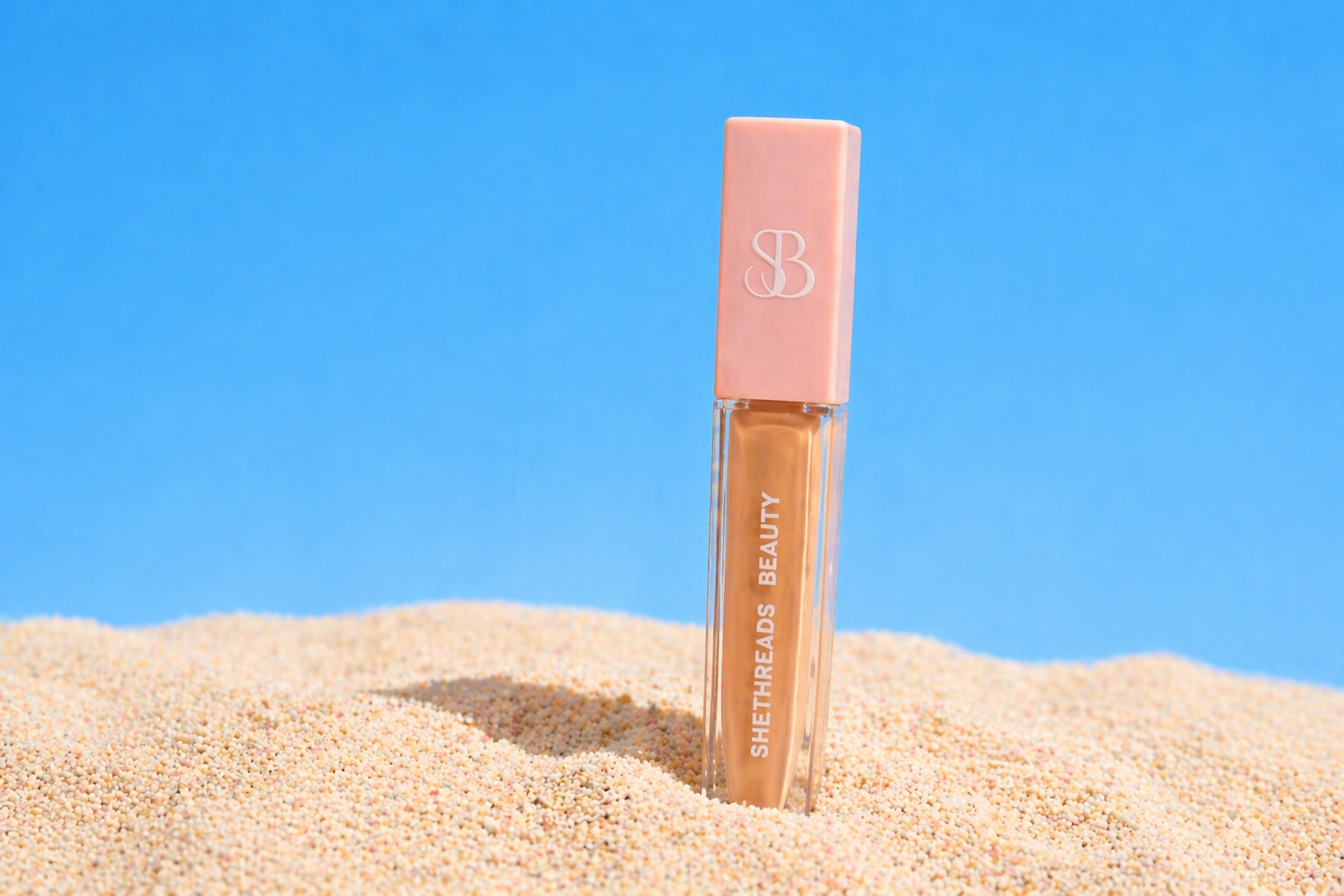 Shethreads Ambition lip gloss on sand