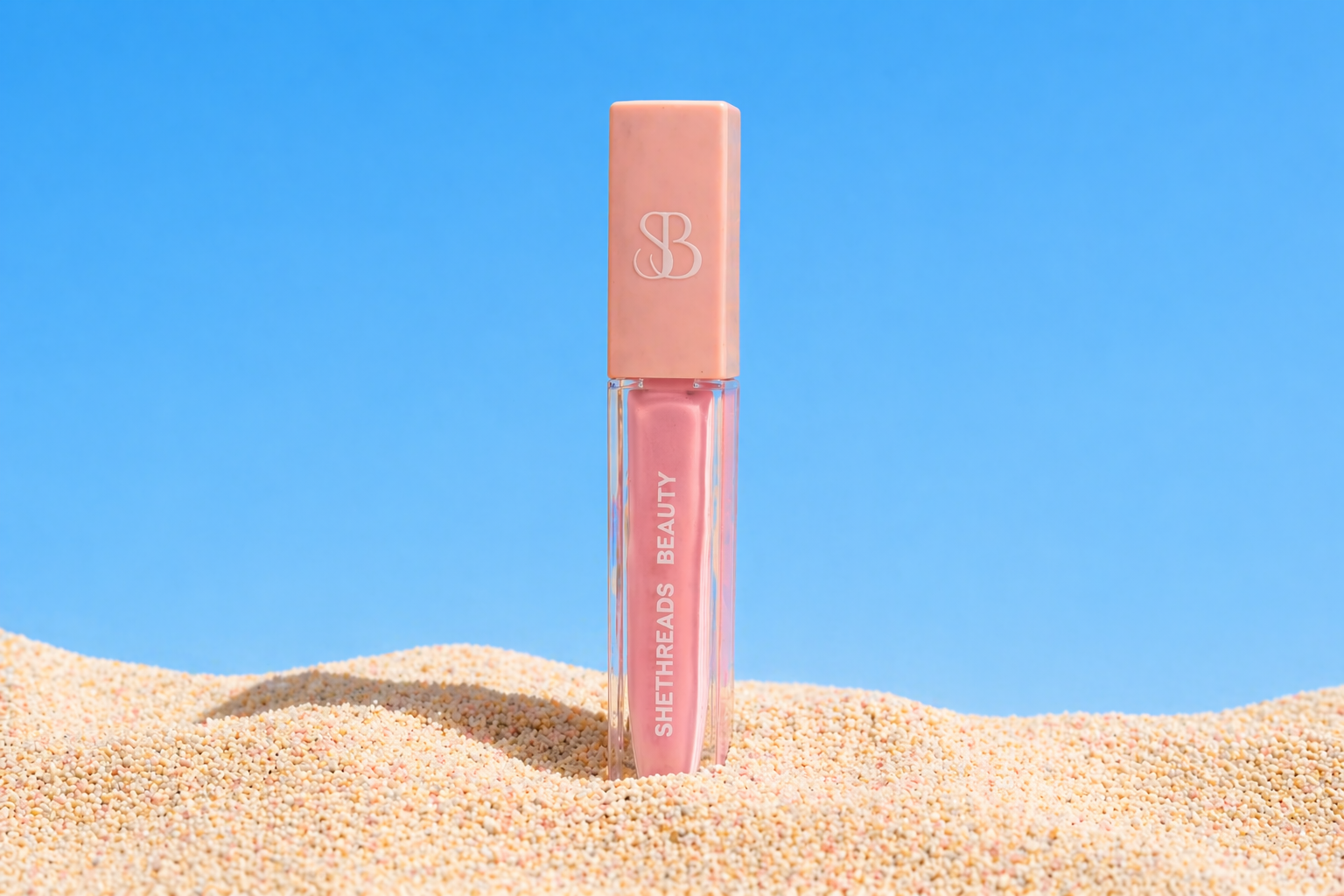 Shethreads Charming lip gloss on sand